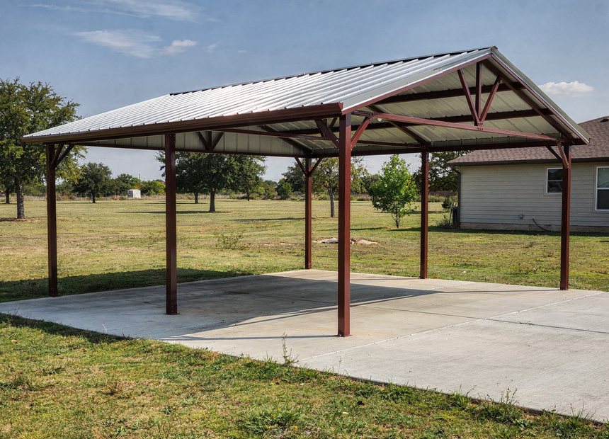 Steel carport and RV cover on a poured slab near San Antonio, TX